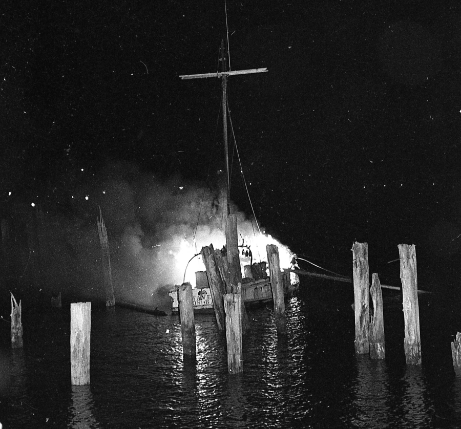 Mike Erdman's fishing boat, 'Waves', caught fire, 1977
