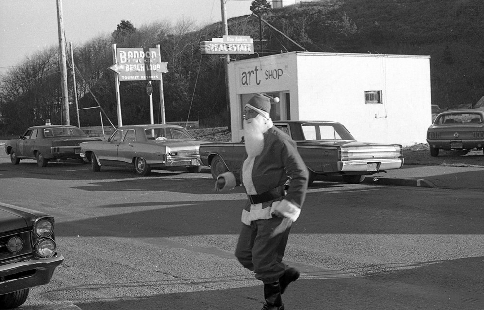 Santa crossing Second Street