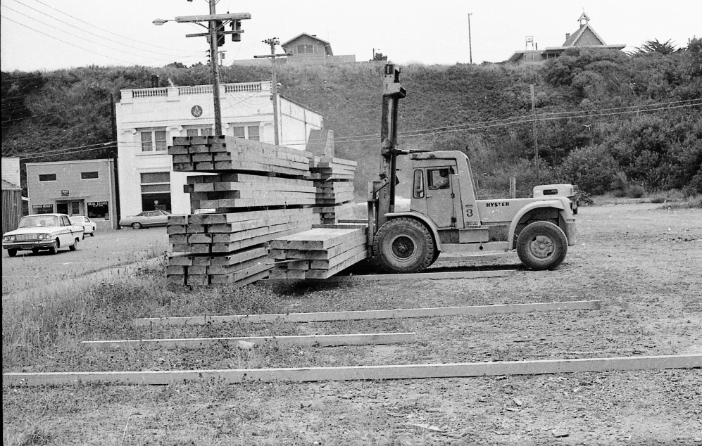 Stacking Moore Mill lumber, 1971