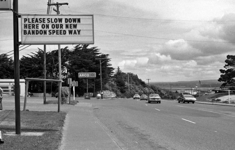 Readerboard sign at the Western Auto store, 1975
