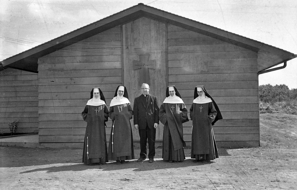 Father Vandehey and four nuns, 1961